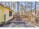 Wooden deck overlooking a wooded backyard at 1094 Plantation Ct, Villa Rica, GA 30180