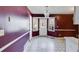 Dining area with bay window and burgundy walls at 1094 Plantation Ct, Villa Rica, GA 30180