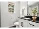 Modern bathroom with black countertop vanity and shower at 118 Bellington Dr, Mcdonough, GA 30253