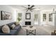 Bright living room featuring a fireplace and hardwood floors at 118 Bellington Dr, Mcdonough, GA 30253