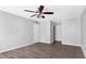 Bright bedroom with ceiling fan, wood floors, and ample space for furniture arrangement at 2510 Cumberland Se Ct, Smyrna, GA 30080