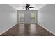 Spacious bedroom with wood floors and large windows at 2510 Cumberland Se Ct, Smyrna, GA 30080