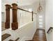 Elegant entryway featuring a wood staircase and modern lighting at 4382 Benfield Se Way, Smyrna, GA 30080