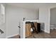 A hallway with a mini-fridge and wine-rack cabinet with hardwood floors at 4382 Benfield Se Way, Smyrna, GA 30080