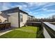 Relaxing rooftop deck featuring artificial turf, outdoor seating and views of the surrounding neighborhood at 4382 Benfield Se Way, Smyrna, GA 30080