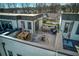 Aerial view of the rooftop terrace, with outdoor seating and dining areas at 4382 Benfield Se Way, Smyrna, GA 30080