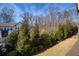 Beautiful view of neighborhood homes and evergreens from the homes upper deck at 4382 Benfield Se Way, Smyrna, GA 30080