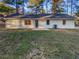 Spacious backyard with a large grassy area at 890 Navajo Trl, Covington, GA 30016