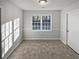 Bright dining area with neutral walls and flooring at 890 Navajo Trl, Covington, GA 30016