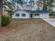 House exterior with a well-maintained lawn at 890 Navajo Trl, Covington, GA 30016