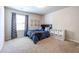 Cozy bedroom with a full bed and storage unit at 145 Lost Cove Sw Dr, Atlanta, GA 30331