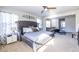 Spacious main bedroom with large bed and sitting area at 145 Lost Cove Sw Dr, Atlanta, GA 30331