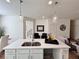 Kitchen island with white quartz countertop and a double sink at 1822 Emory Ln # 89, Conyers, GA 30013