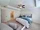 Bright main bedroom with king bed, en-suite bathroom access, and relaxing sitting area at 1822 Emory Ln # 89, Conyers, GA 30013