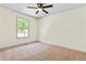 Bright bedroom with carpeted floor and ceiling fan at 456 Pine Shadows Dr, Dallas, GA 30157