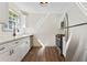 Updated kitchen with stainless steel appliances and white cabinets at 456 Pine Shadows Dr, Dallas, GA 30157