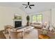 Living room with vaulted ceiling, fireplace, and hardwood floors at 456 Pine Shadows Dr, Dallas, GA 30157