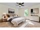 Main bedroom with king bed, dresser, and natural light at 456 Pine Shadows Dr, Dallas, GA 30157