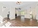Open concept living area with kitchen, dining, and living room at 456 Pine Shadows Dr, Dallas, GA 30157