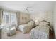 Charming bedroom with twin beds and serene wall decor at , Atlanta, GA 30327