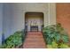 Inviting front porch with brick steps and lush landscaping at , Atlanta, GA 30327