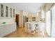 Bright kitchen with white cabinets, breakfast bar, and stainless steel appliances at , Atlanta, GA 30327