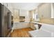 Modern kitchen with white cabinets and hardwood floors at , Atlanta, GA 30327