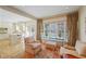 Kitchen features island, white cabinetry, and hardwood floors at , Atlanta, GA 30327