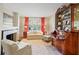 Spacious living room with hardwood floors, fireplace and large windows at , Atlanta, GA 30327