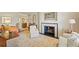 Living room features a fireplace, comfortable seating, and an area rug at , Atlanta, GA 30327