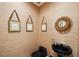 Stylish powder room with black pedestal sink and decorative mirror at , Atlanta, GA 30327