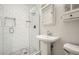 Modern bathroom with white subway tile and glass shower at 1276 Hickory Sw Dr, Lilburn, GA 30047