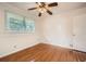 Bedroom featuring hardwood floors and ceiling fan at 1276 Hickory Sw Dr, Lilburn, GA 30047