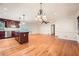 Bright dining area with hardwood floors and chandelier at 1276 Hickory Sw Dr, Lilburn, GA 30047