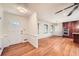 Bright entryway with hardwood floors and view into the living room at 1276 Hickory Sw Dr, Lilburn, GA 30047