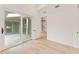 Bedroom with hardwood floors and sliding glass doors to patio at 145 Arcadia Ave, Fayetteville, GA 30214