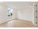 Bright bedroom featuring hardwood floors and large windows at 145 Arcadia Ave, Fayetteville, GA 30214