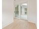 Bright hallway with sliding glass doors leading to patio at 145 Arcadia Ave, Fayetteville, GA 30214