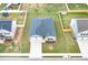 Aerial view of house, driveway, and surrounding homes at 2058 Dickons Garden Ln, Mcdonough, GA 30253