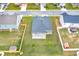 Aerial view of house and backyard, showcasing patio at 2058 Dickons Garden Ln, Mcdonough, GA 30253