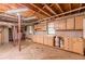 Unfinished basement with built-in cabinets and potential for extra storage at 3390 Kenland Se Rd, Smyrna, GA 30082