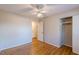 Hardwood floor bedroom with closet and ceiling fan at 3390 Kenland Se Rd, Smyrna, GA 30082