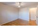 Hardwood floor bedroom with ceiling fan at 3390 Kenland Se Rd, Smyrna, GA 30082