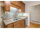 Modern kitchen with stainless steel sink and updated cabinets at 3390 Kenland Se Rd, Smyrna, GA 30082