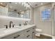 Bathroom with double vanity, marble countertops, and large mirror at 540 Saddle Shoals Dr, Lawrenceville, GA 30046