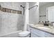 Bathroom with tub, shower, and granite countertop at 540 Saddle Shoals Dr, Lawrenceville, GA 30046