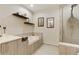 Modern bathroom with soaking tub and glass shower at 1080 Peachtree Ne St # 1402, Atlanta, GA 30309