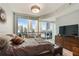 Bright bedroom with city views and a comfy bed at 1080 Peachtree Ne St # 1402, Atlanta, GA 30309