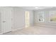 Light and airy bedroom with attached bathroom at 115 N Devereux Nw Ct, Atlanta, GA 30327