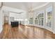 Bright dining room with hardwood floors and large windows at 115 N Devereux Nw Ct, Atlanta, GA 30327